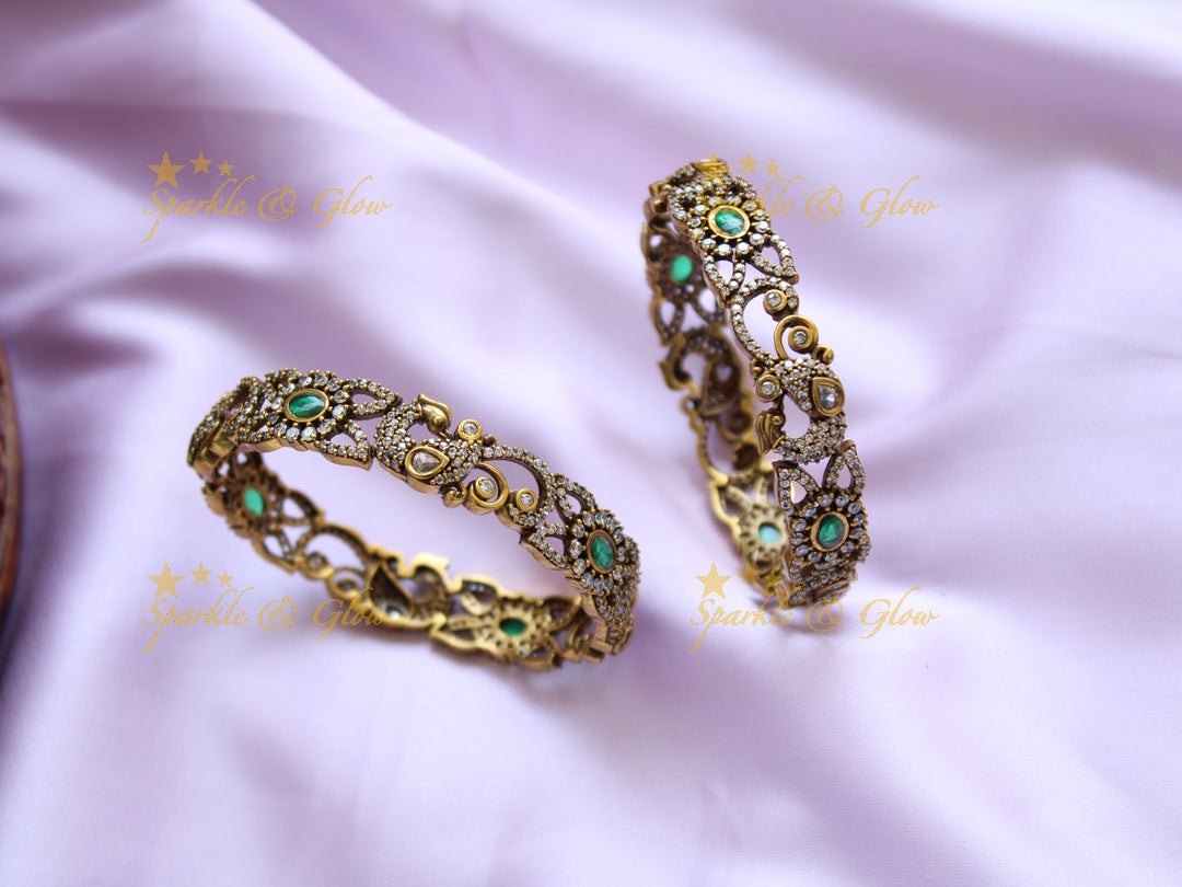 Elegant peacock floral design victorian bangles with green stones a pair, 2.8