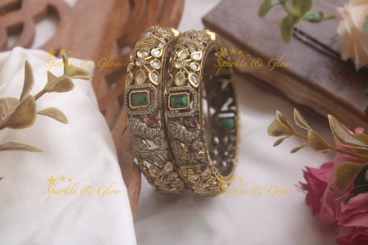 Beautiful peacock design victorian bangles with emerald a pair,