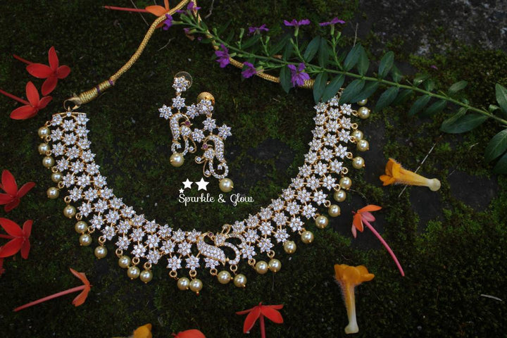 AD stones flower / star designed peacock necklace - White