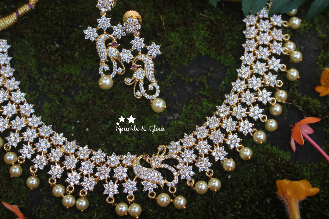 AD stones flower / star designed peacock necklace - White
