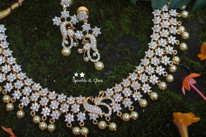 AD stones flower / star designed peacock necklace - White