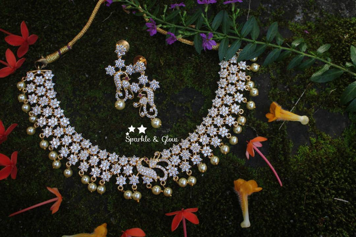 AD stones flower / star designed peacock necklace - White