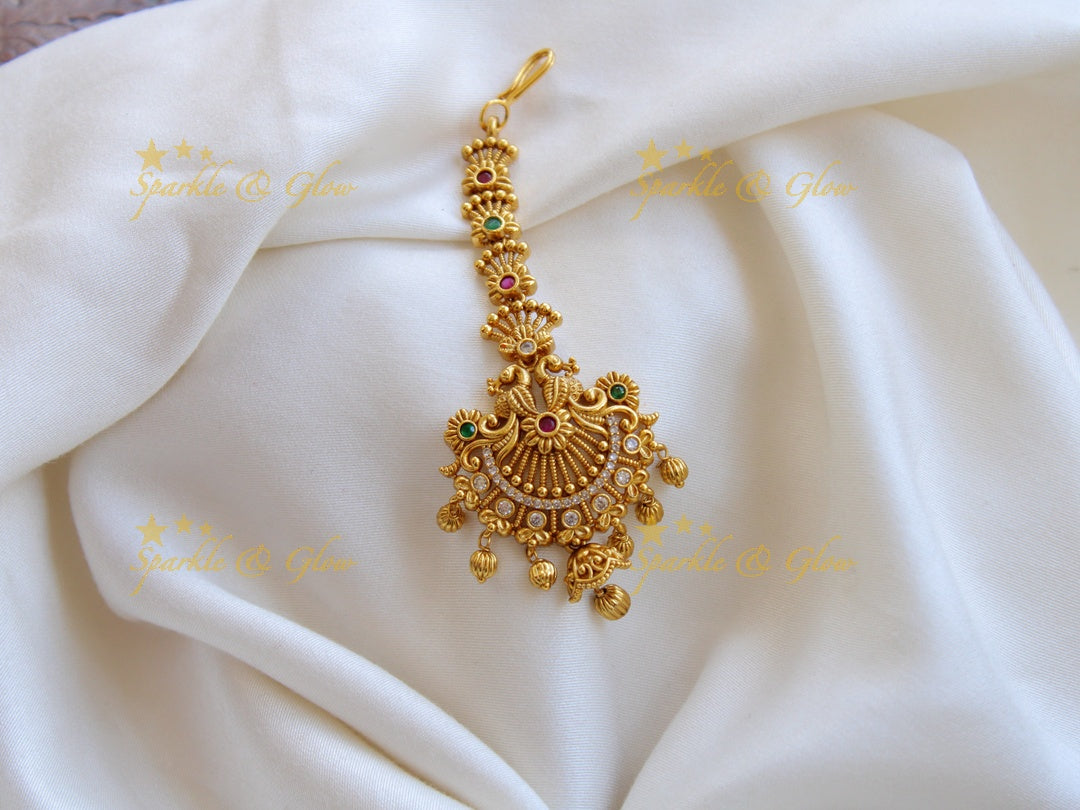 Gold alike Peacock and floral maang tikka with gold beads and multi color stones