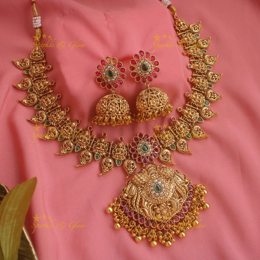 Elegant Gold alike Lakshmi peacock mango short necklace with ruby emerald and green beads - Sparkle and Glow