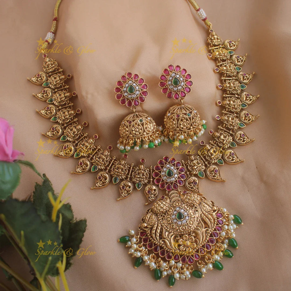 Elegant Gold alike Lakshmi peacock mango short necklace with ruby emerald and green beads - Sparkle and Glow