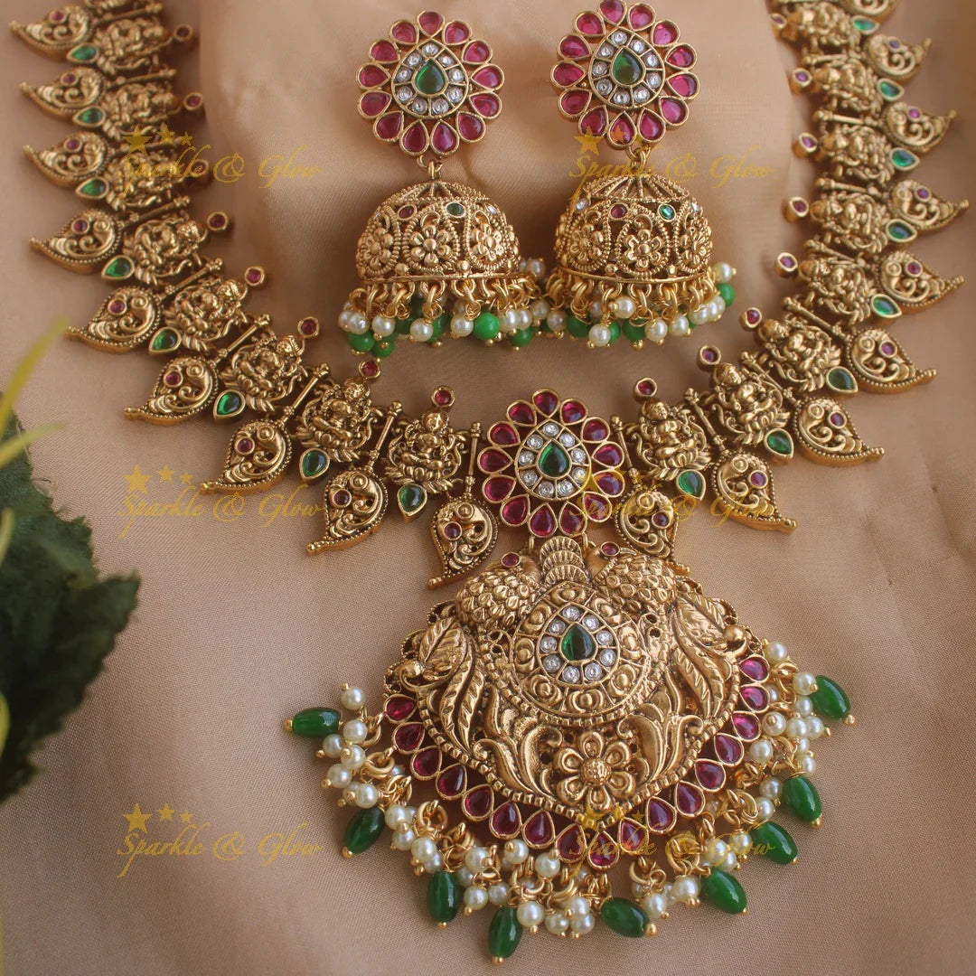 Elegant Gold alike Lakshmi peacock mango short necklace with ruby emerald and green beads - Sparkle and Glow