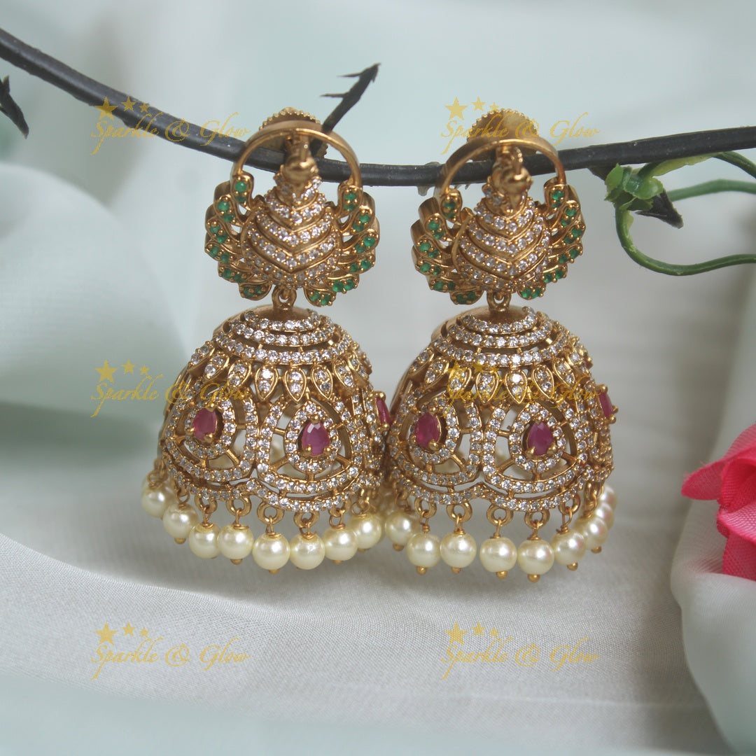 Beautiiful peacock studded premium matte cz jhumukas