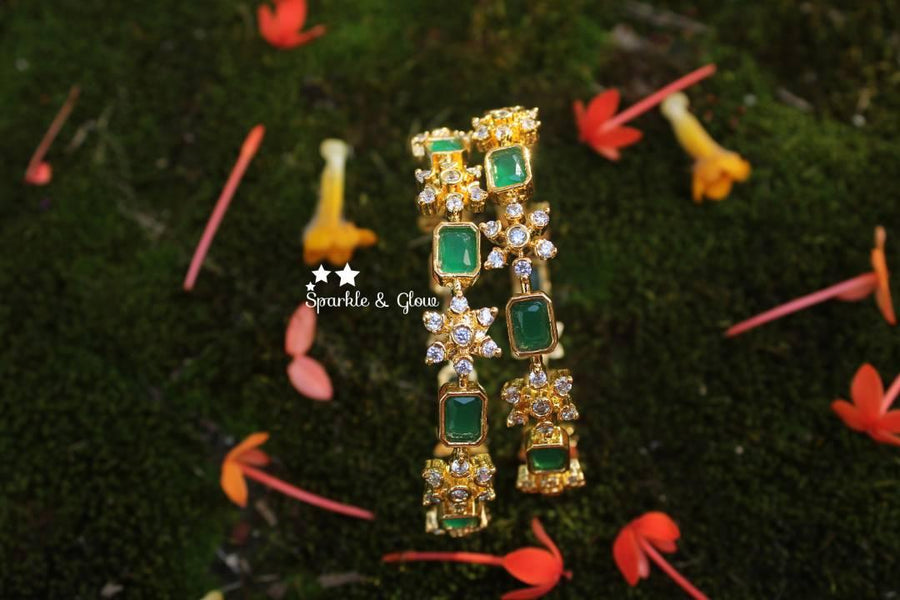 Gold polished snow flake shaped AD stones bangles a pair - Sparkle and Glow