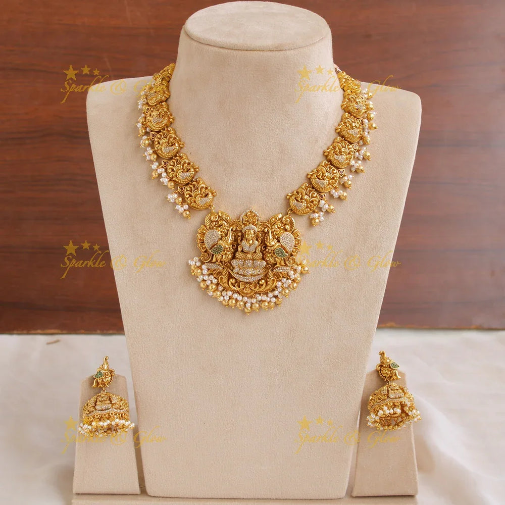 Elegant Gold alike Lakshmi dancing peacock short necklace with cz stones and gold beads - Sparkle and Glow