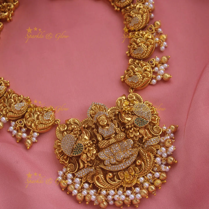 Elegant Gold alike Lakshmi dancing peacock short necklace with cz stones and gold beads - Sparkle and Glow