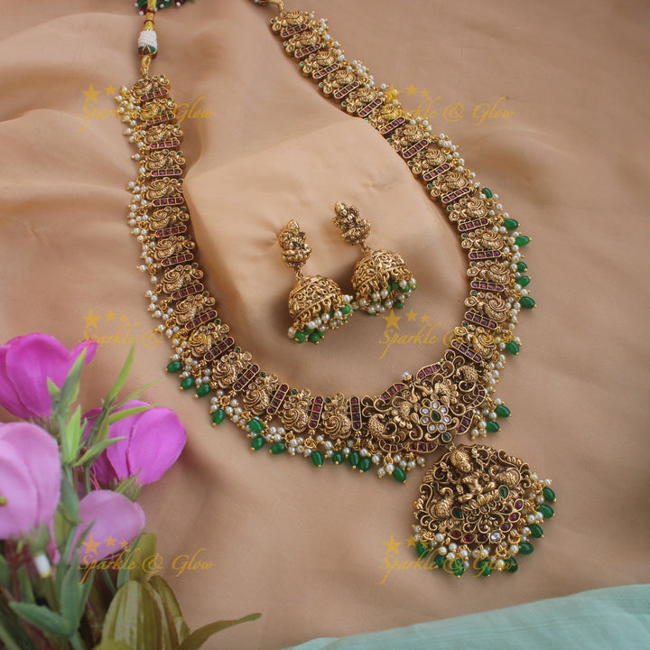 Gorgeous Lakshm peacock carved gutta pusalu long necklace with ruby and green beads