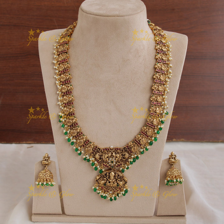 Gorgeous Lakshm peacock carved gutta pusalu long necklace with ruby and green beads