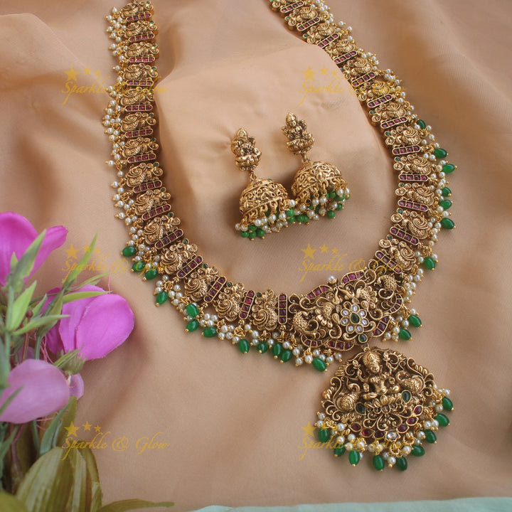 Gorgeous Lakshm peacock carved gutta pusalu long necklace with ruby and green beads