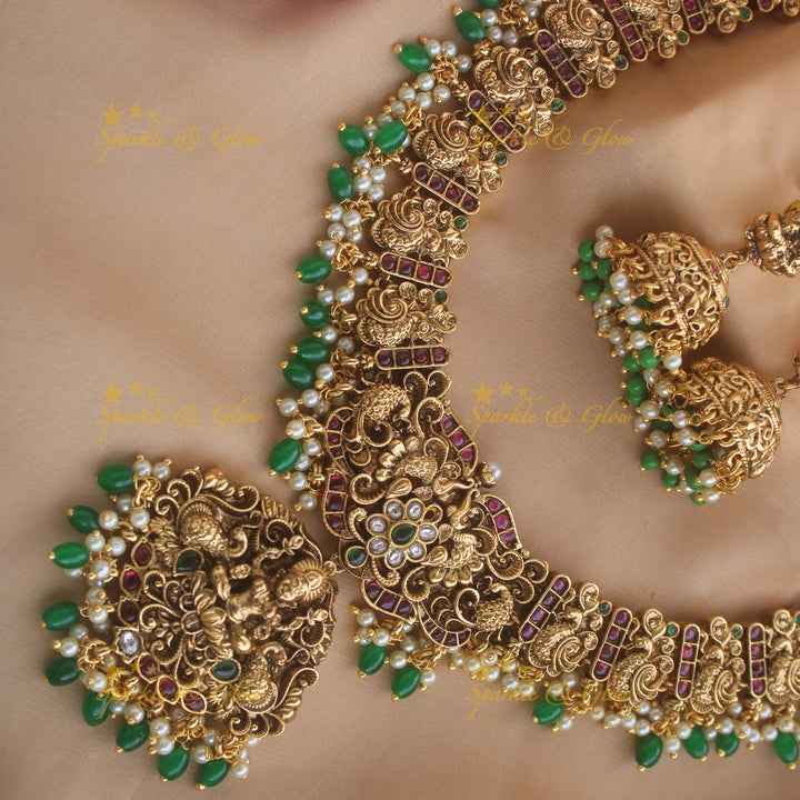 Gorgeous Lakshm peacock carved gutta pusalu long necklace with ruby and green beads