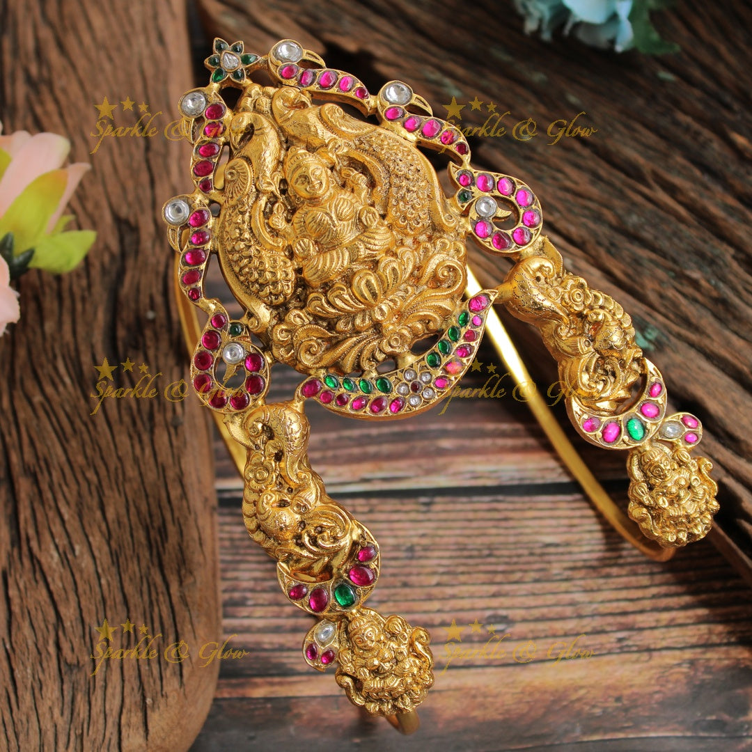 Jadau Exclusive Gold alike Lakshmi peacock carved U shaped vanki with multi colour stones, single pc