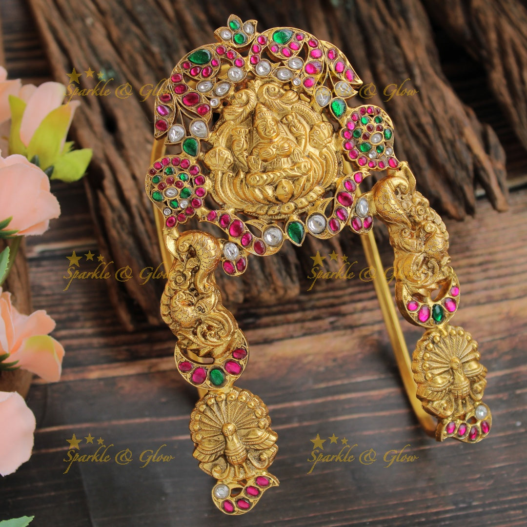 Jadau Beautiful Gold alike Lakshmi dancing peacock carved U shaped vanki with multi colour stones, single pc