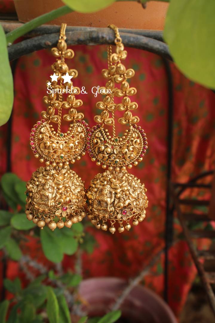 Gold alike polished intricate work lakshmi jhumuaks with ear chain