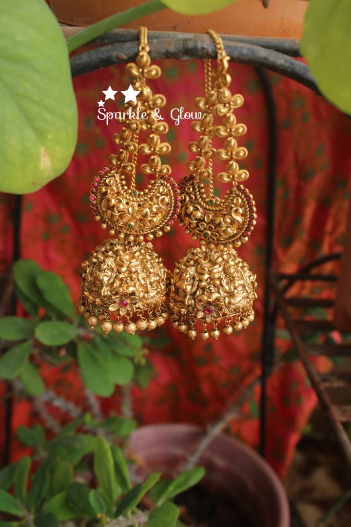 Gold alike polished intricate work lakshmi jhumuaks with ear chain