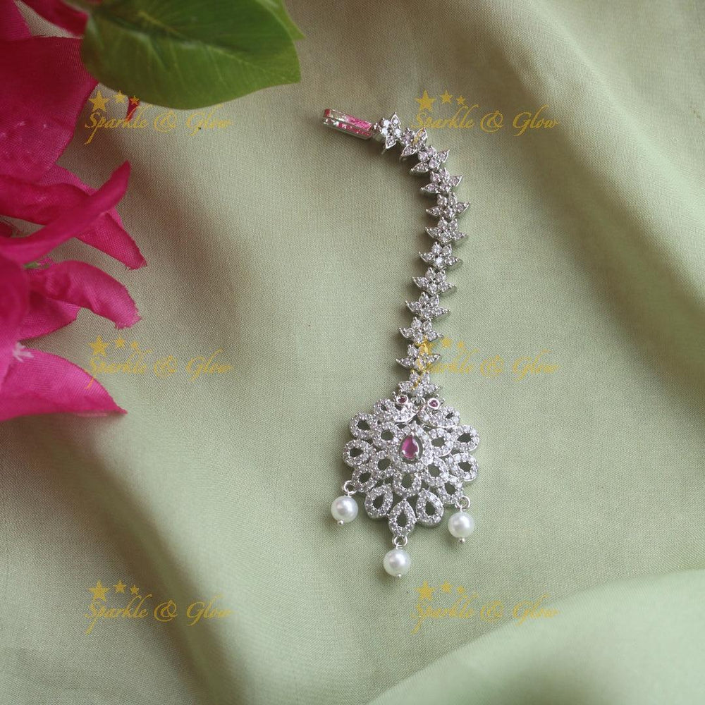 Stunning silver polish peacock water drop maang tikka with pearls and emerald - Sparkle and Glow