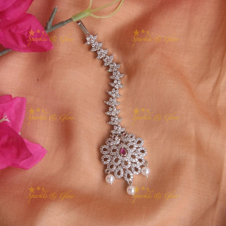 Stunning silver polish peacock water drop maang tikka with pearls and emerald - Sparkle and Glow