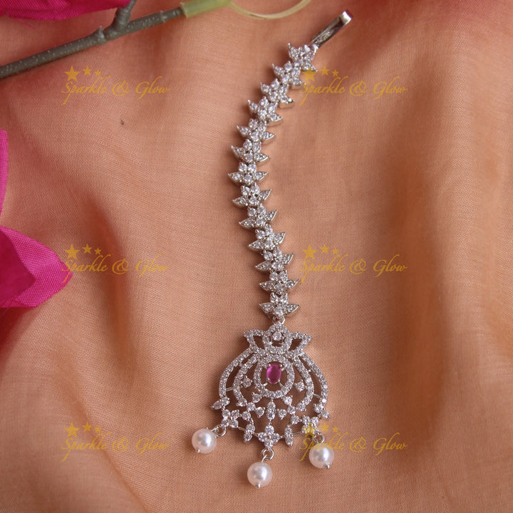 Exclusive silver polish floral and leaf maang tikka with pearls and ruby