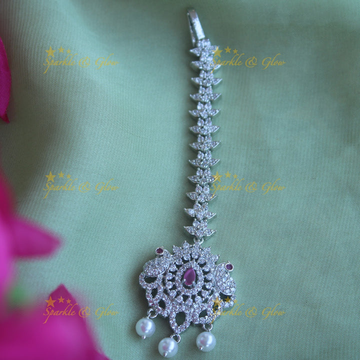 Statement silver polish peacock and floral maang tikka with pearls and ruby