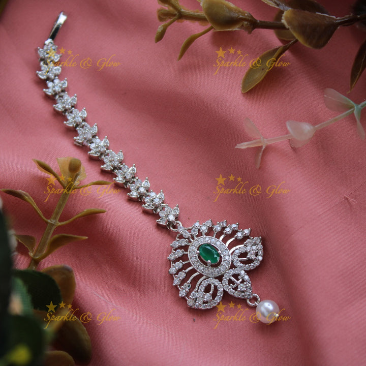 Exclusive silver polish peacock feather design maang tikka with pearl and emerald