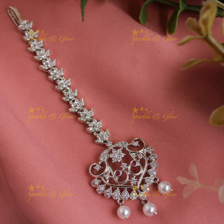 Beautiful silver polish peacock and flower design maang tikka with pearl drops