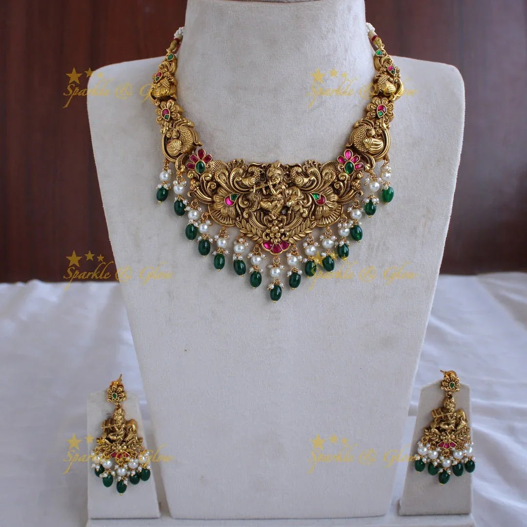Exclusive Krishna playing flute Jadau short necklace with pearls and green beads - Sparkle and Glow