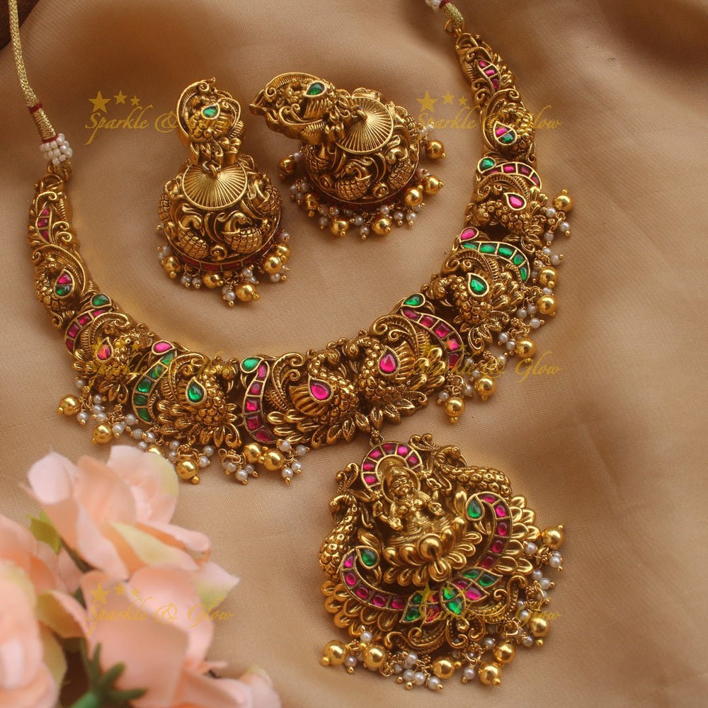 Gorgeous Lakshmi peacock carved short necklace with green beads - Sparkle and Glow - Gold - Back Thread