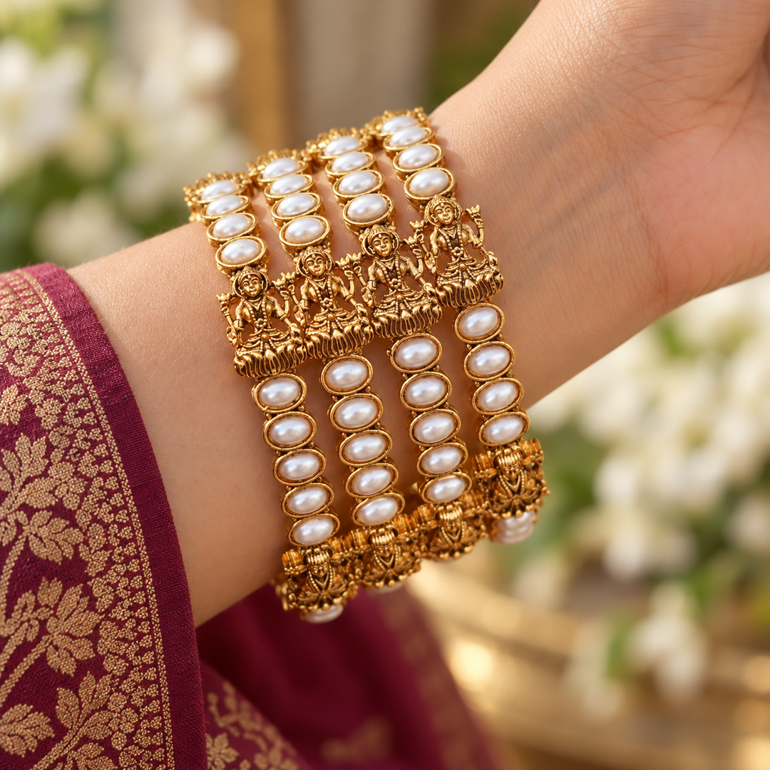 Temple Bangles with Idol Motifs for Festive Elegance