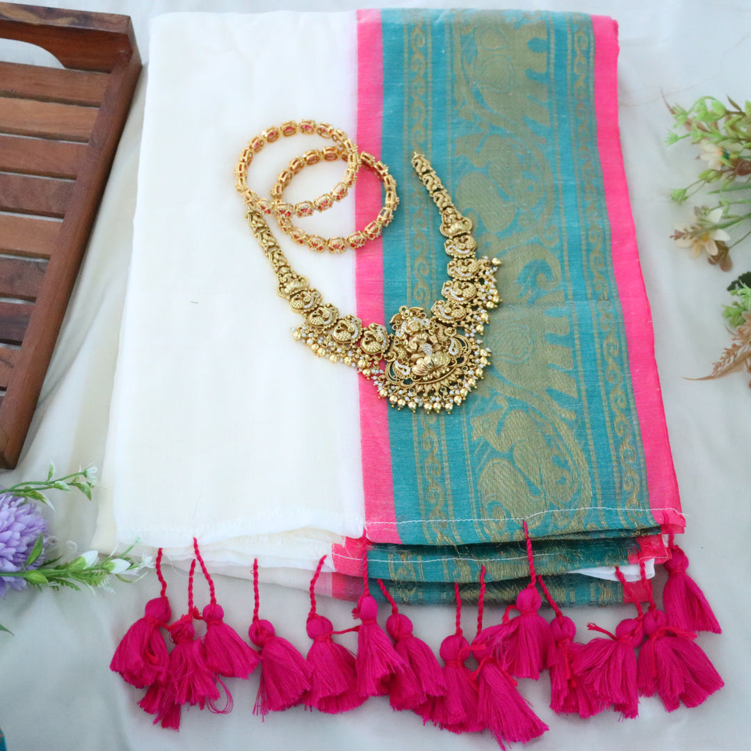 Elegant Kerala Saree with Zaree Border & Tassels